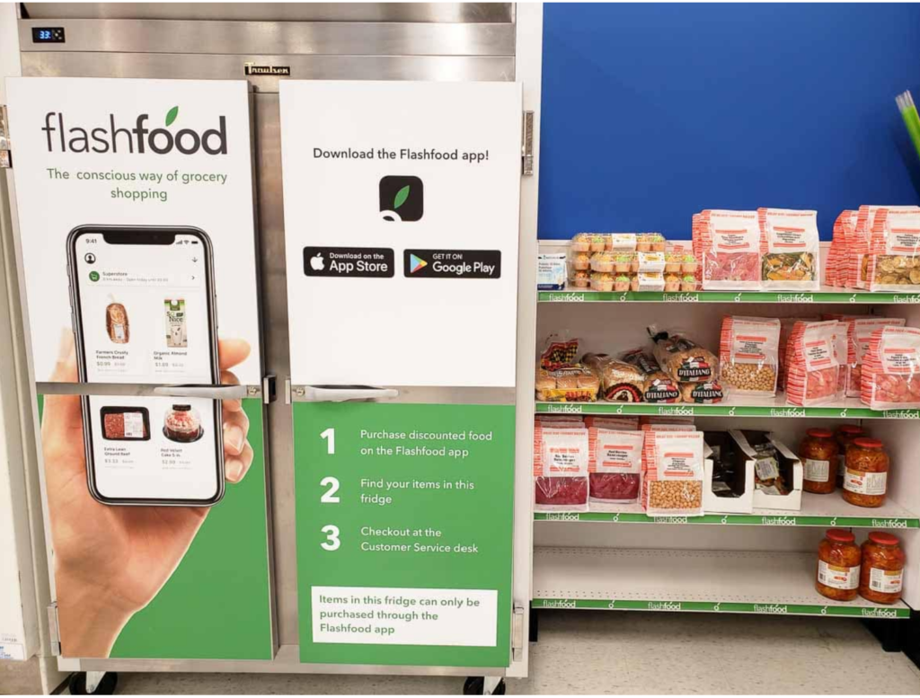 Flashfood refridgerator and shelves at a grocery store. A great way to save on groceries and reduce waste by purchasing food that is approaching its best before date