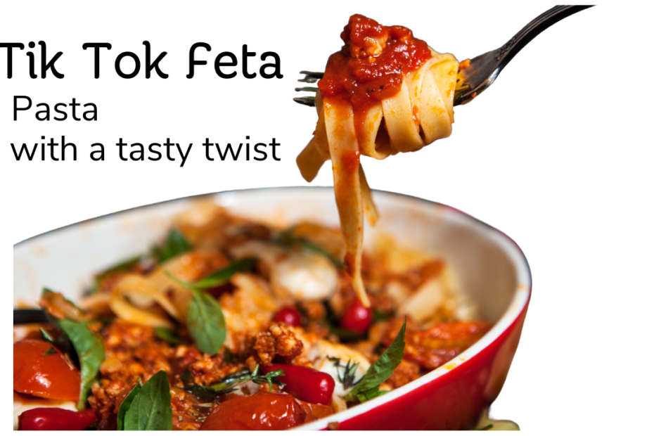 Tik Tok Feta Pasta with a tasty twist image of a casserole dish of pasta with lots of tomatoes and basil, and some pasta twisted around a fork just above the casserole.