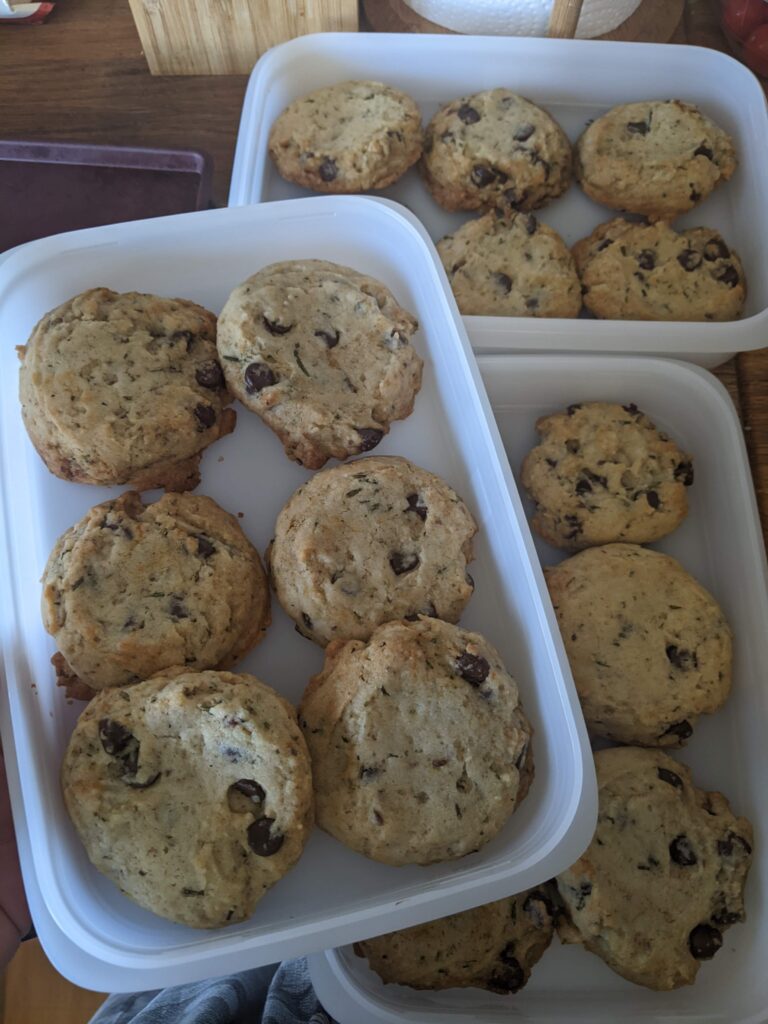 Rosemary chocolate chip cookies in a Tupperware Freezer Mates Stackable container